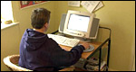 A boy using a computer