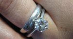 A wedding ring and engagement ring