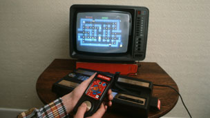 Playing a 1980s games console